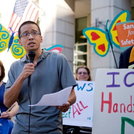 A photo of Brandon Wu at a protest